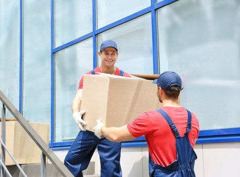 Removals vehicle and movers handling a Primrosehill property move