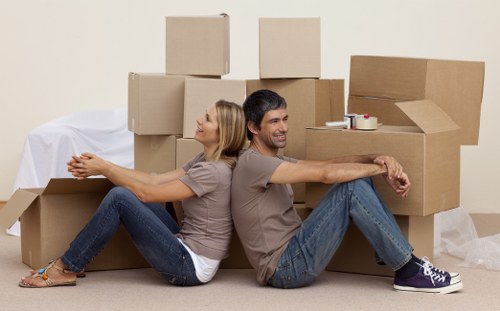 Packed moving boxes and furniture ready for removals in Primrosehill