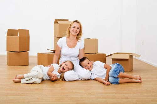 Packed boxes and furniture ready for household storage in Primrosehill