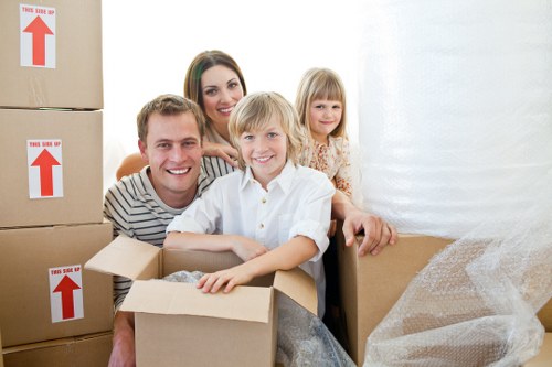 Experienced movers handling furniture during a Primrosehill flat relocation