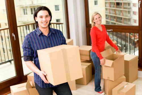 Removal team handling household items during a Primrosehill relocation